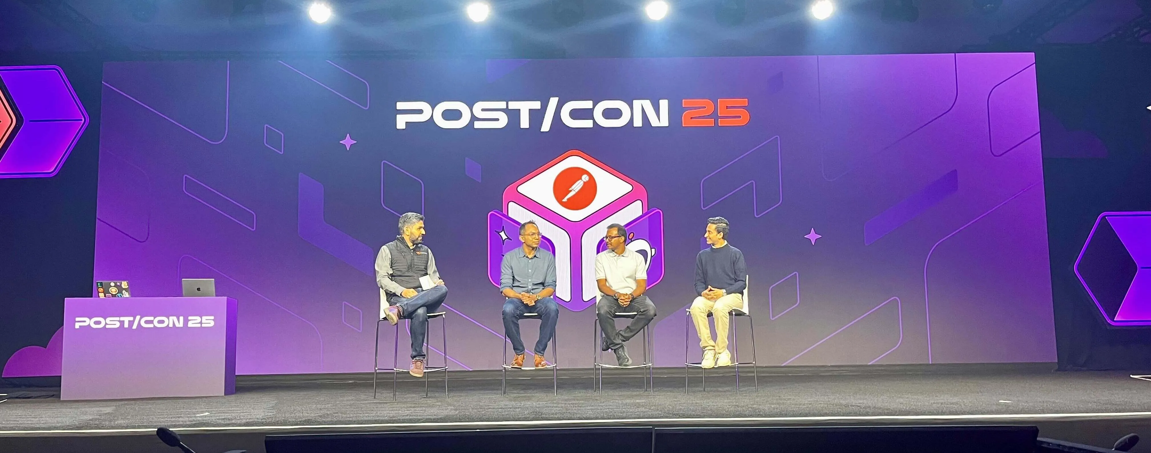 Keynote stage with Ankit Sobti from Postman, Srini Iragavarapu from AWS, Rangaprabhu Parthasarathy from Meta, and Sambhav Jain from Deacgon.