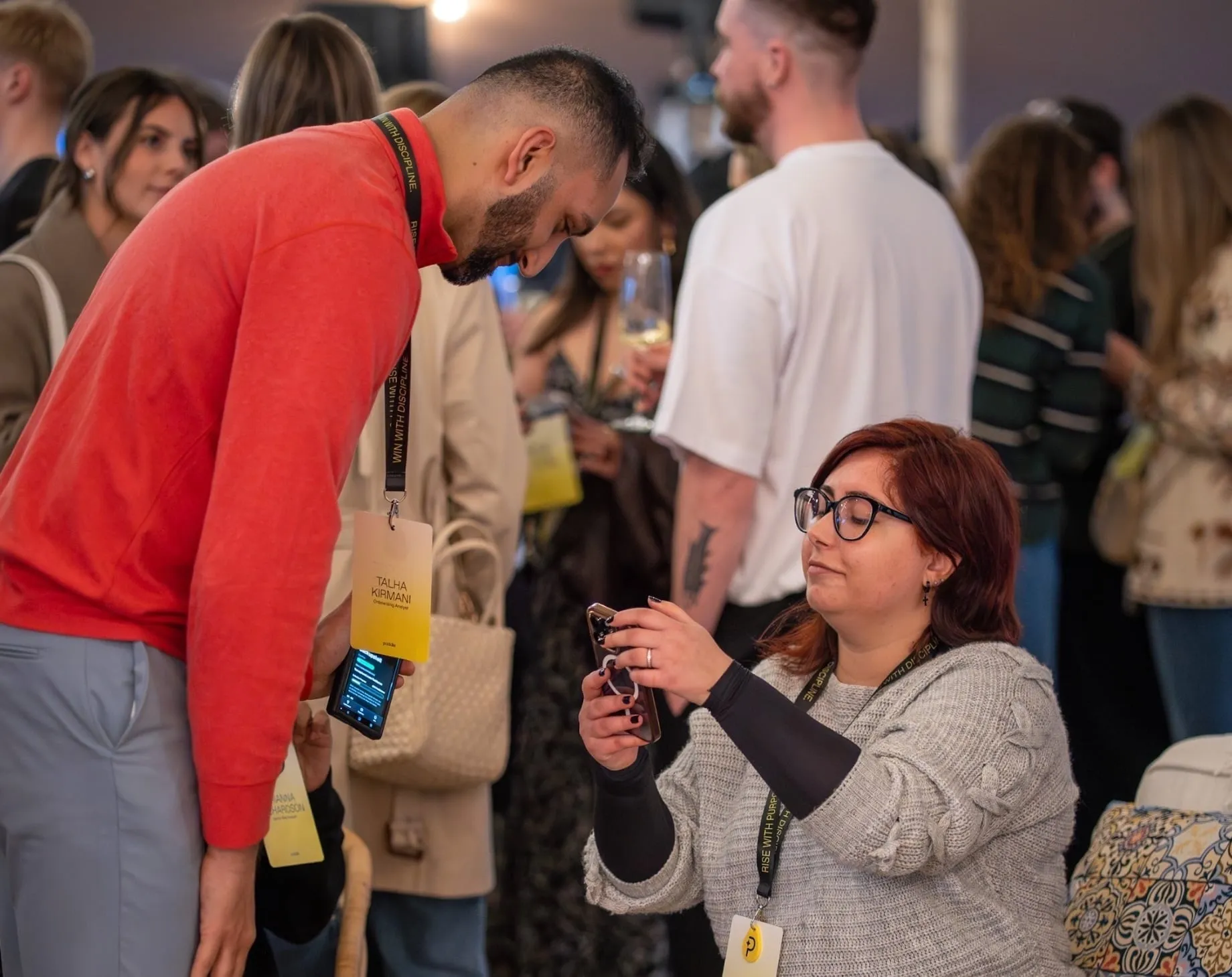 Players tapping badges to collect characters in the Paddleverse.